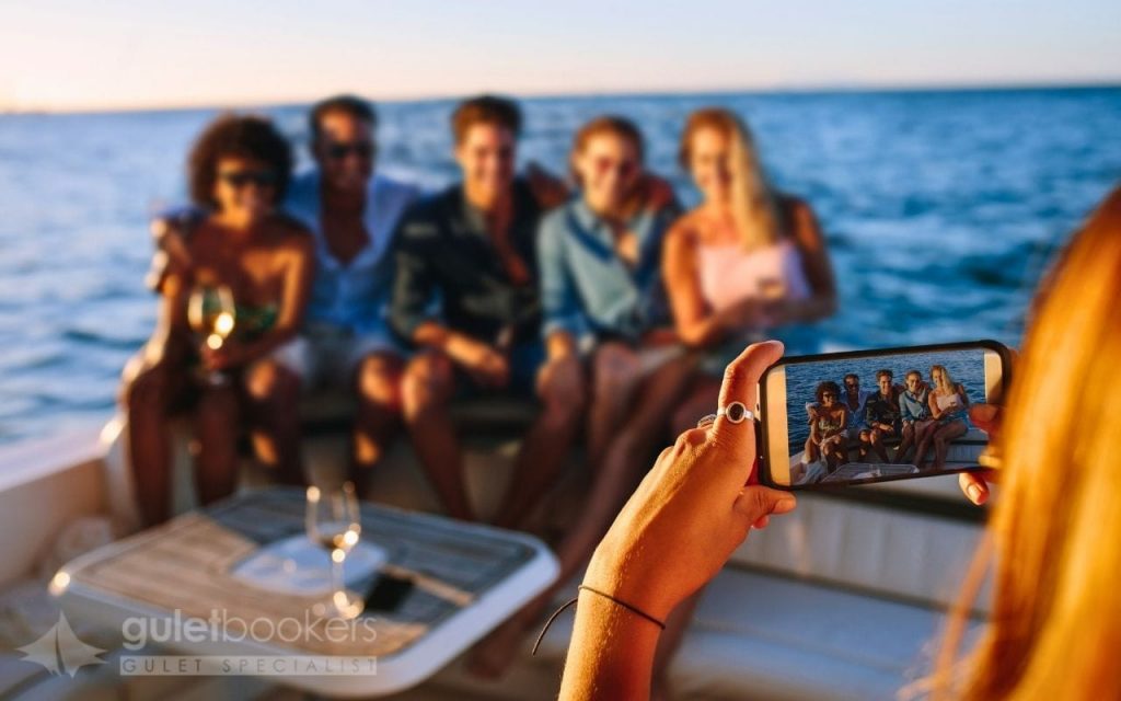 The way the light dances on the gentle waves, with your private luxury yacht silhouetted in the background, creates footage that feels more like a movie scene than a vacation video.