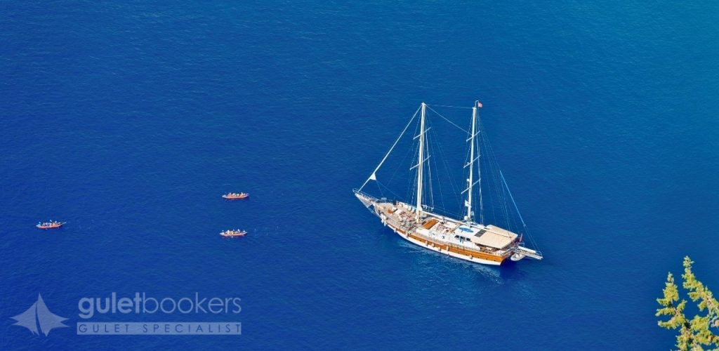 There's something undeniably special about savoring the freshest seafood while anchored in a secluded bay, the gentle Mediterranean breeze carrying the aroma of grilled fish across the deck.