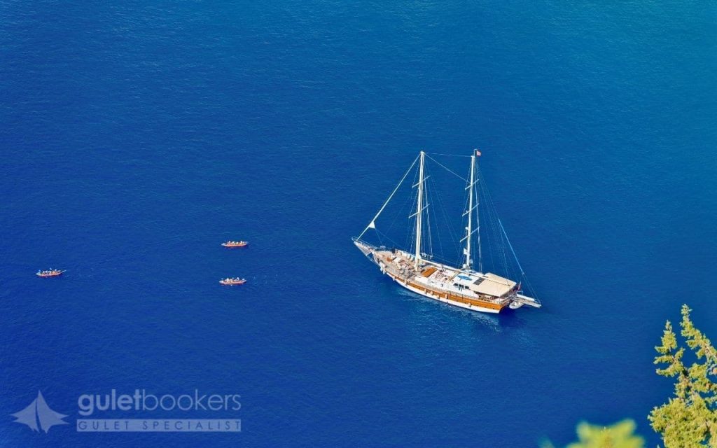 There's something undeniably special about savoring the freshest seafood while anchored in a secluded bay, the gentle Mediterranean breeze carrying the aroma of grilled fish across the deck.